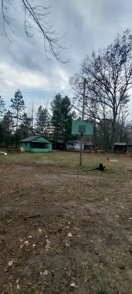 Custom yard cleanup service for residential properties across Kalkaska, MI - Robert's Lawn Service