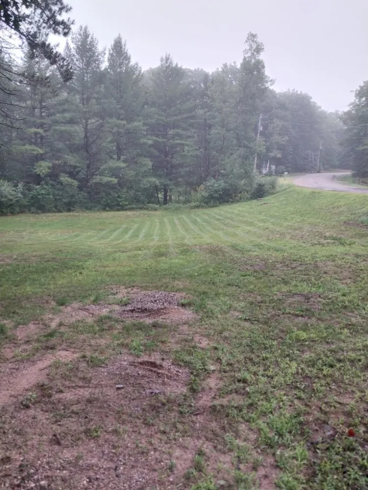 Affordable yard maintenance for year-round maintenance in Kalkaska, MI by Robert's Lawn Service