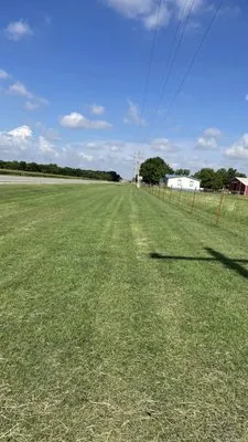 Roberts Mowing Logo