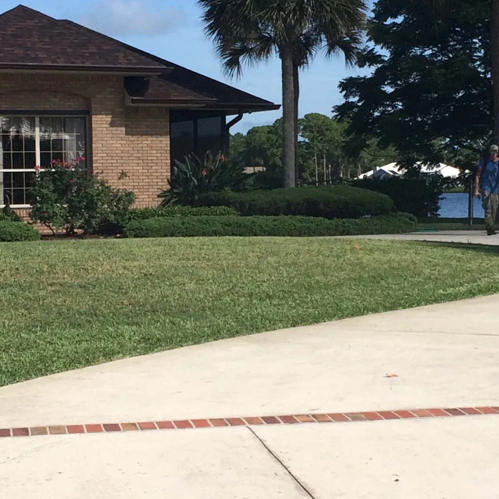 Reliable yard maintenance for homes across Melbourne, FL - Robertson's Lawn Care