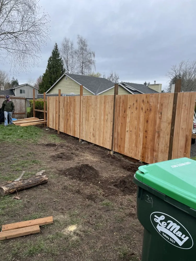 Affordable yard cleanup service with custom design in Olympia, WA by Robinson and Son