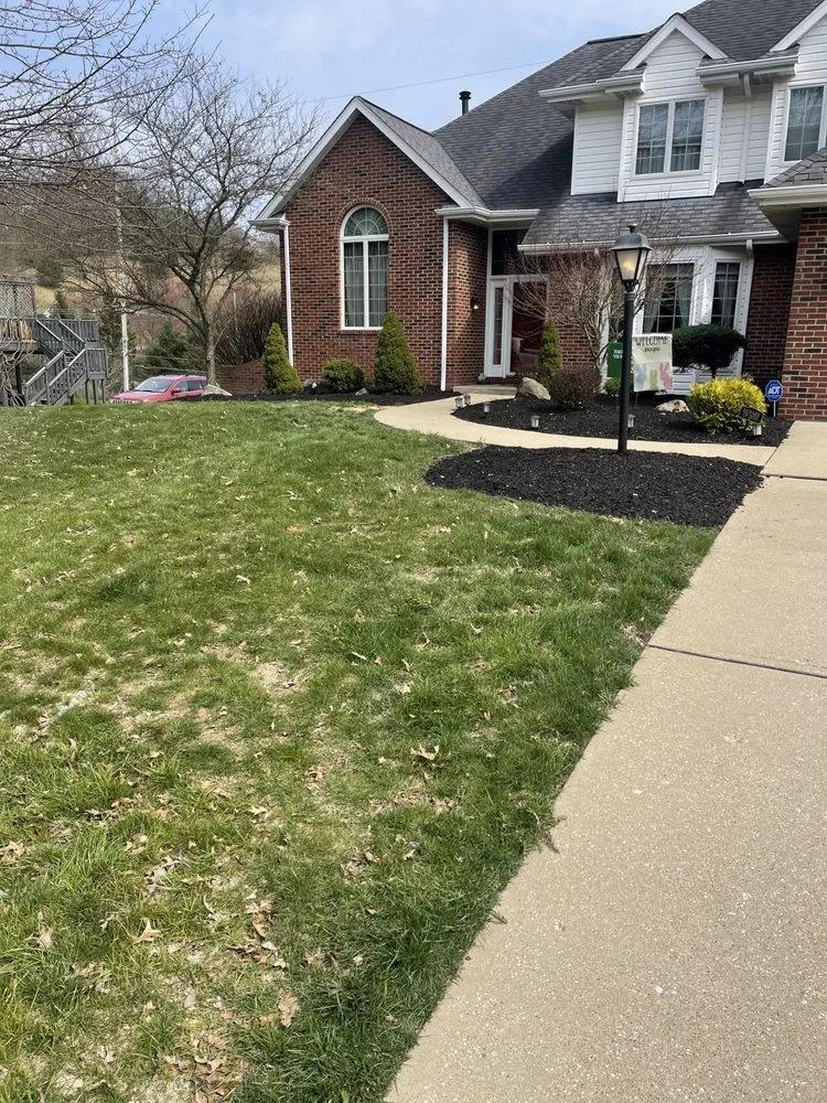 Professional yard cleanup service for homes in Ambridge, PA by Robinson Landscaping Services