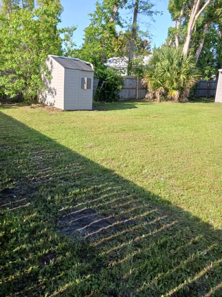Custom landscape installation for homes in Panama City, FL by Robinson's Lawn Care