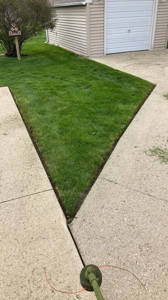Professional yard cleanup service with custom design across Asbury, IA - Robs Lawn Care And More