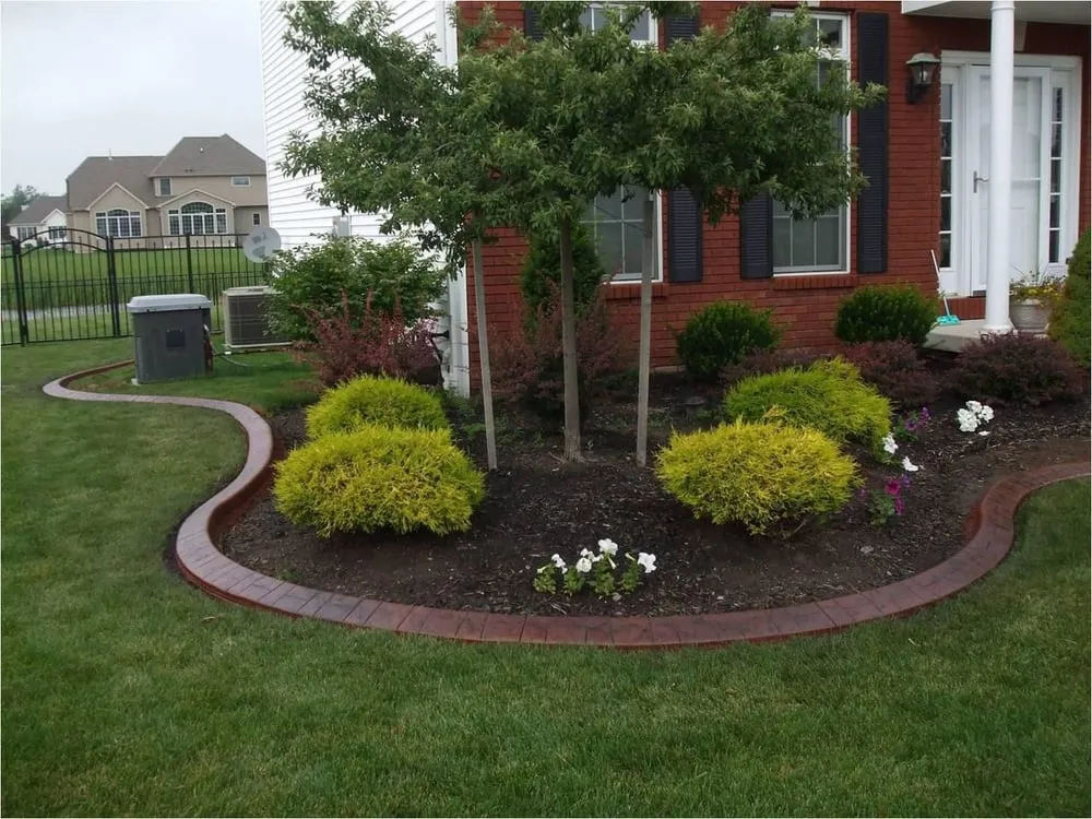 Custom landscape installation in Spencerport, NY by ROC Curbing