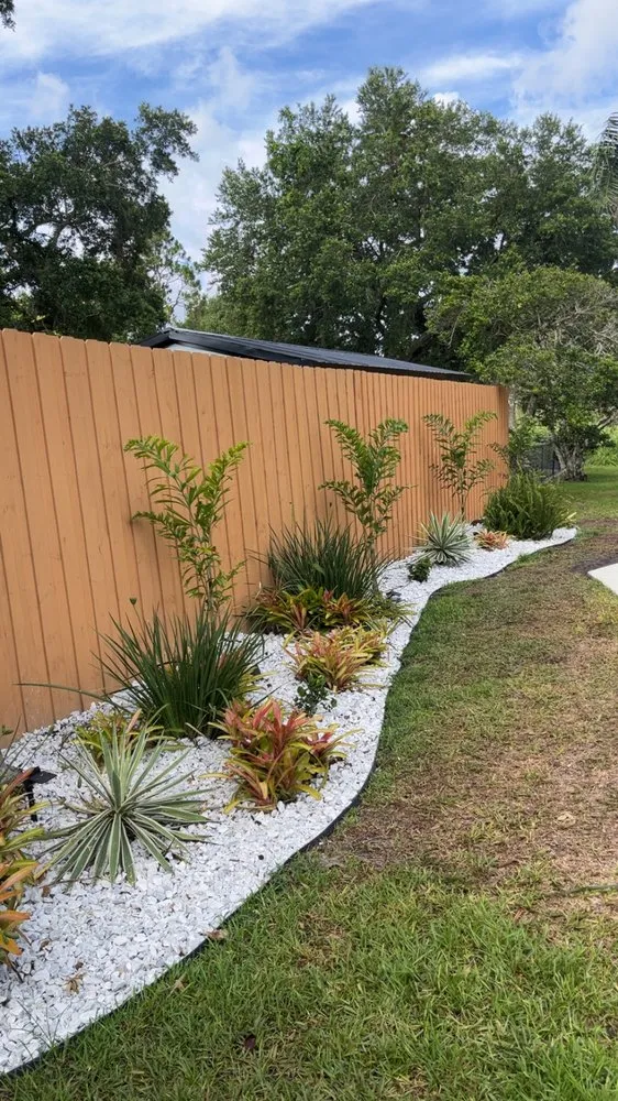 Trusted lawn care service for residential properties in St. Cloud, FL by Rock & Root Custom Landscaping