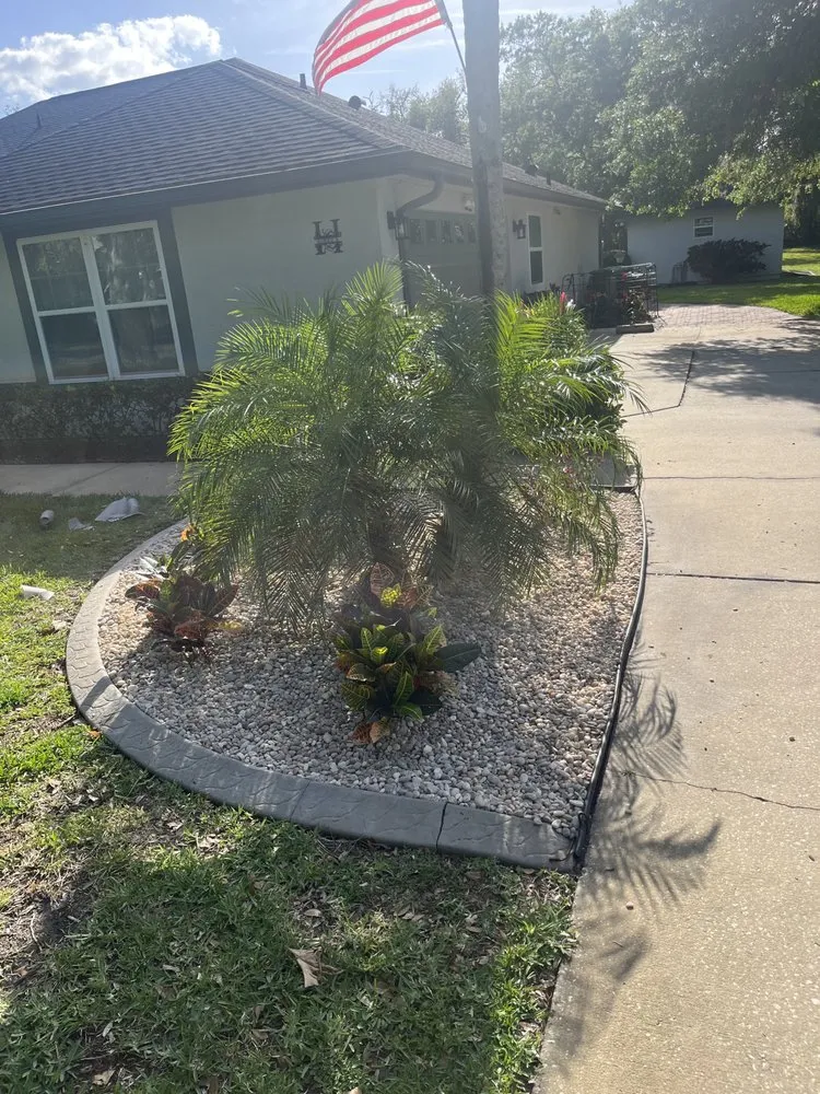 Top-rated outdoor landscaping with custom design in St. Cloud, FL by Rock & Root Custom Landscaping