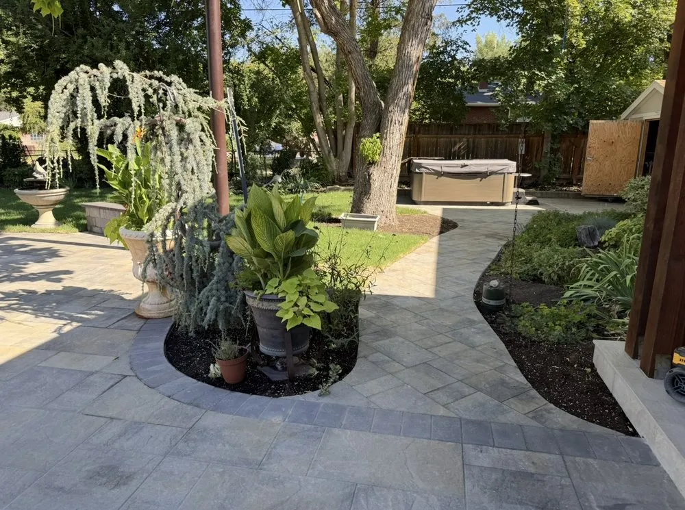 Affordable yard cleanup service with custom design in West Jordan, UT by Rock & Root Landscaping