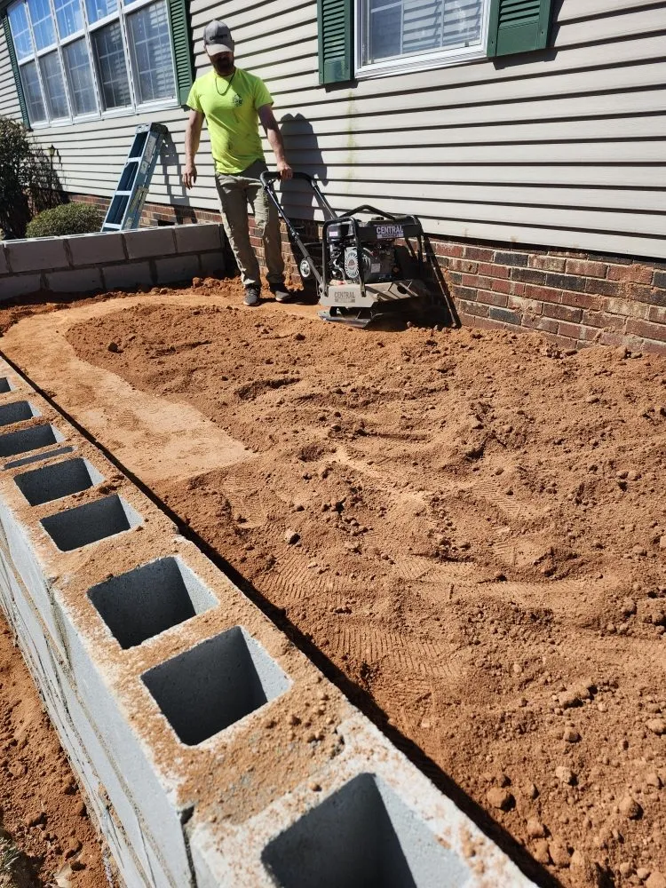 Custom lawn care service for year-round maintenance in Lincolnton, NC by Rock & Timber Backyard Creations