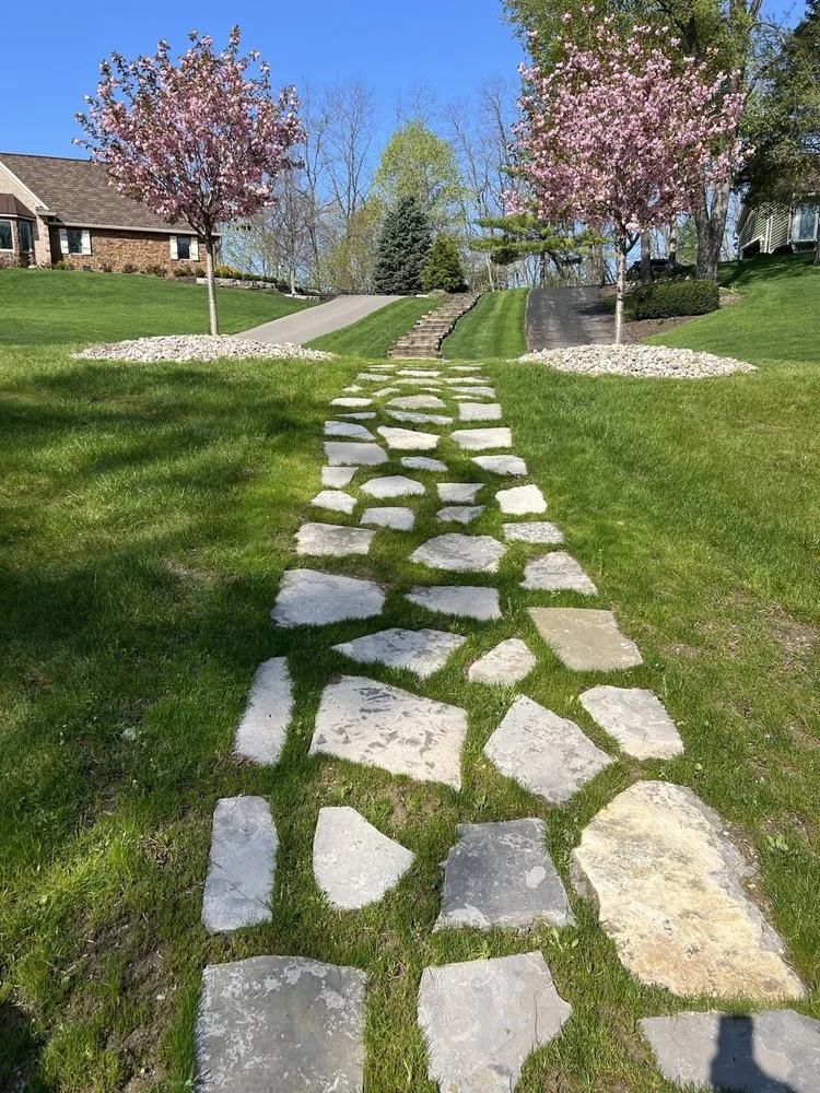 Top-rated lawn care service for homes in Highland, MI by Rock Bottom Stone Supply II