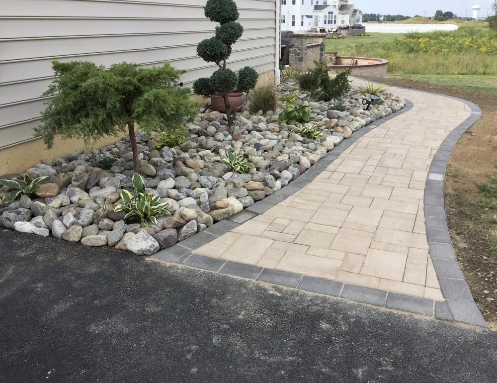 Affordable yard cleanup service in Newark, DE by Rock Diamond Paving
