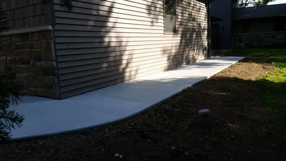 Custom residential landscaping in Antigo, WI by Rock Hard Concrete