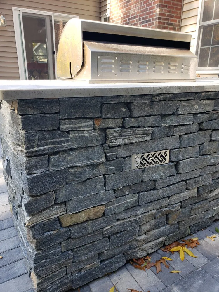 Custom yard maintenance for homes in East Hampton, CT by Rock Landscaping & Construction