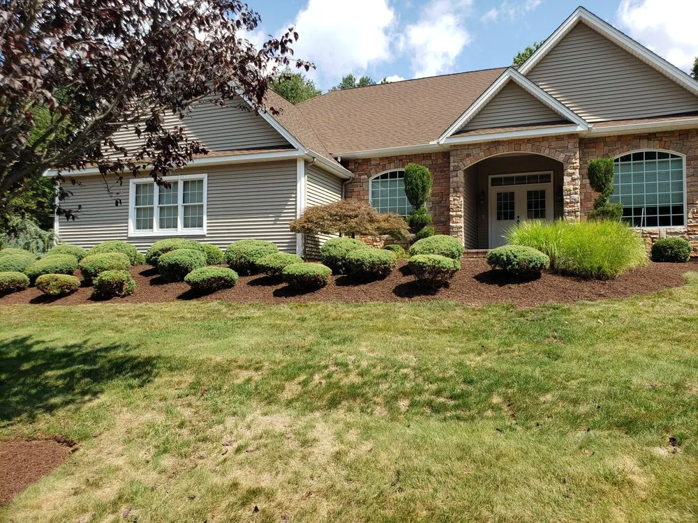 Trusted yard cleanup service with custom design in East Hampton, CT by Rock Landscaping & Construction