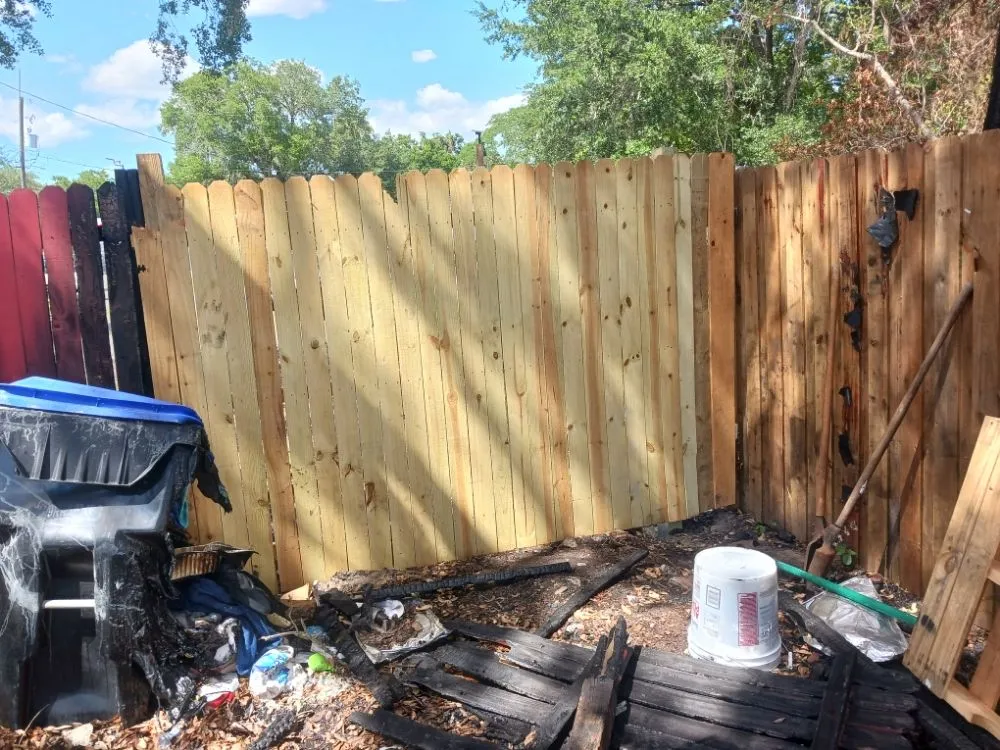 Affordable landscape design in Oakland Park, FL - Rock Laying & Wooden Fence