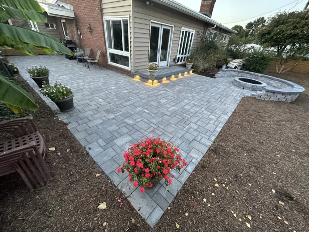 Professional lawn mowing service for residential properties across Pikesville, MD - Rock N Roll Hardscapes