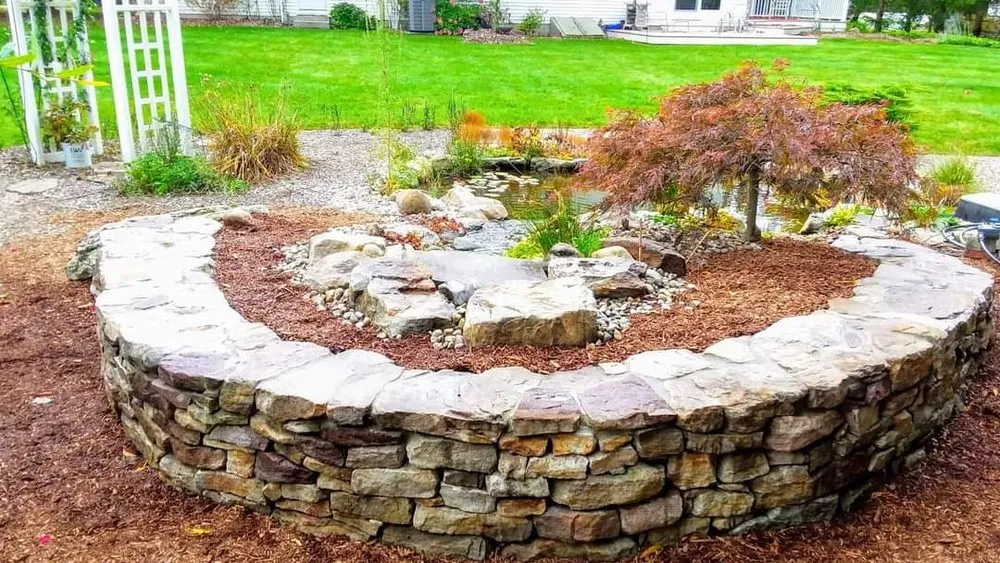 Affordable yard maintenance in Nashua, NH - Rock-Pebble-Shears