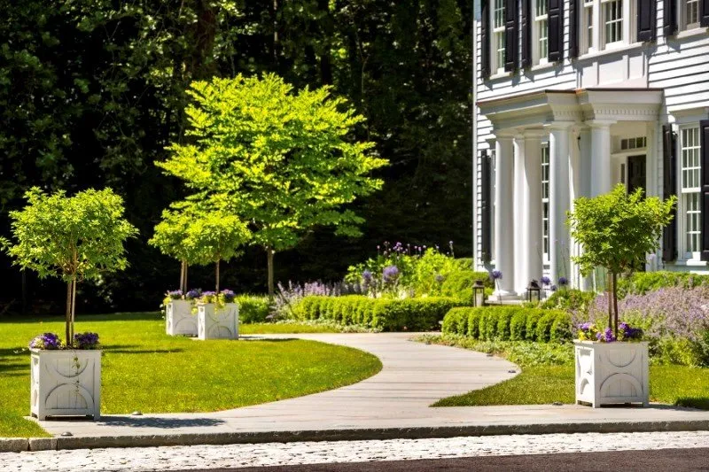 Affordable lawn mowing service in Bedford Hills, NY by Rock Shelter Landscape Design & Construction