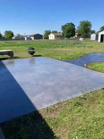 Custom lawn mowing service for outdoor upgrades across Eau Claire, WI - Rock Solid Concrete & Landscape