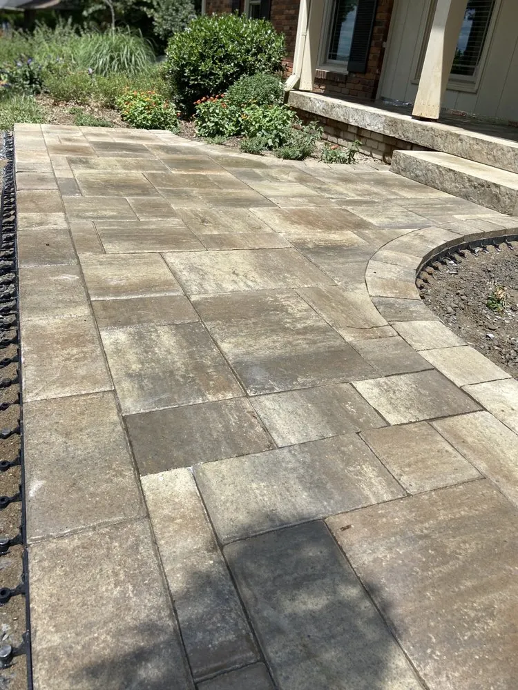 Custom yard cleanup service for year-round maintenance in Goodlettsville, TN by Rock Solid Landscapes - RSL