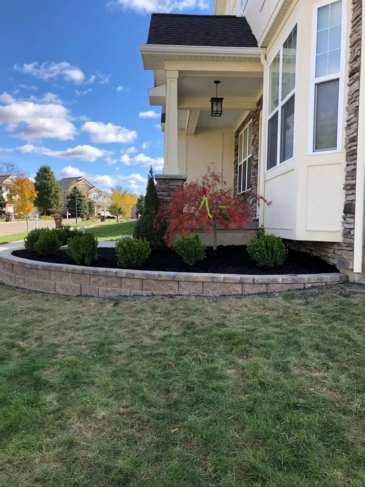 Trusted yard cleanup service in East Lansing, MI by Rock Solid LandScaping & Snow Removal