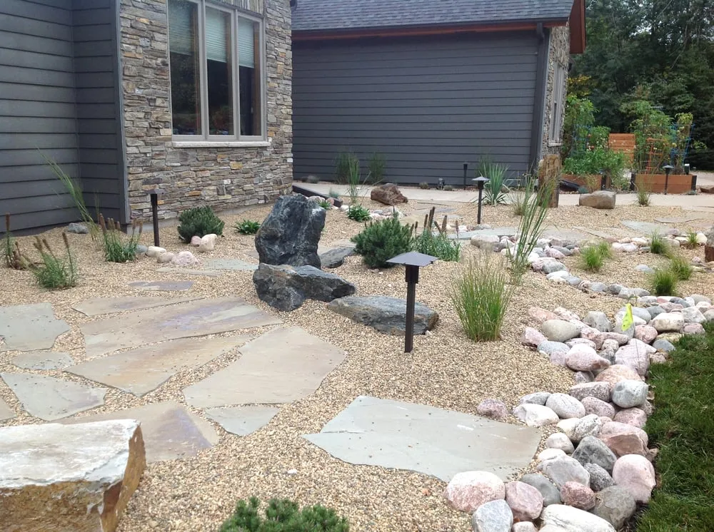 Expert yard cleanup service for year-round maintenance in Oronoco, MN by Rock Solid Retaining Walls & Landscaping