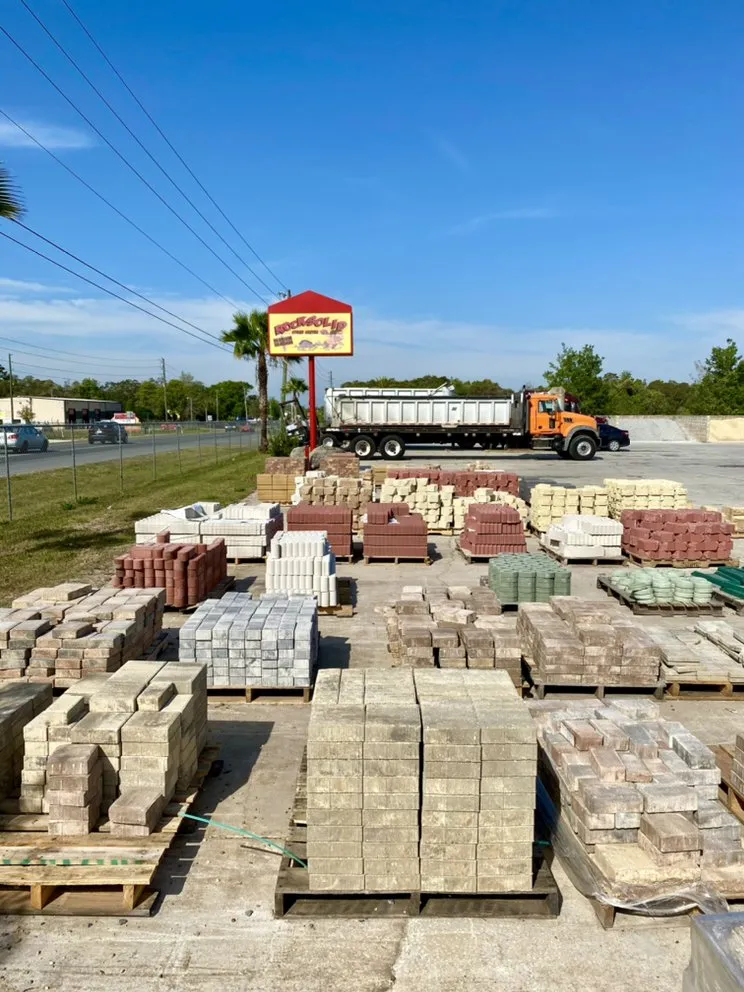 Reliable lawn mowing service for homes in Spring Hill, FL by Rock Solid Stone Center