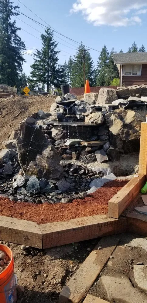 Affordable landscaping services for year-round maintenance in Lacey, WA by Rock Solid Tree & Landscape Services