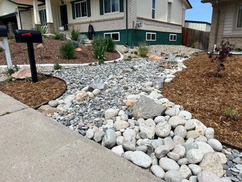 Trusted lawn mowing service for year-round maintenance in Arvada, CO by Rock Steady Landscaping & Design