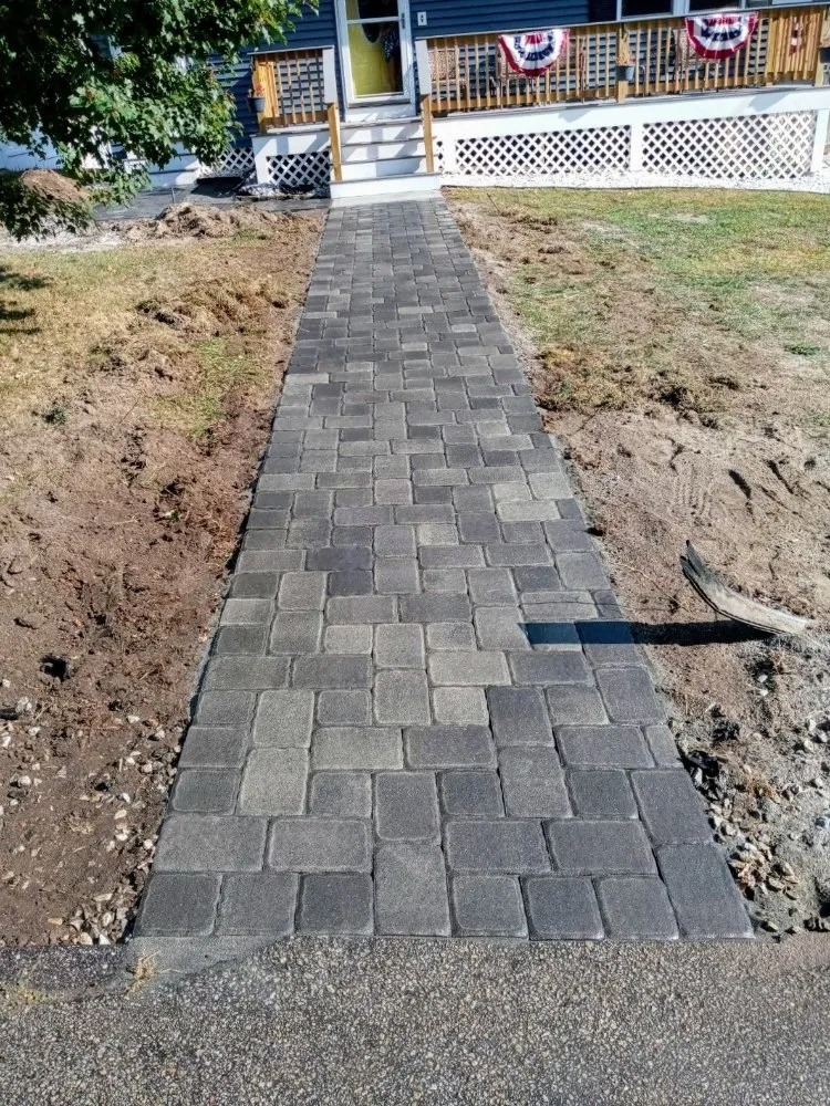 Expert lawn mowing service in Lowell, MA by Rock Steady Landscaping & Masonry