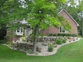 Expert lawn mowing service for year-round maintenance in Salem, UT by Rock Wall Guys