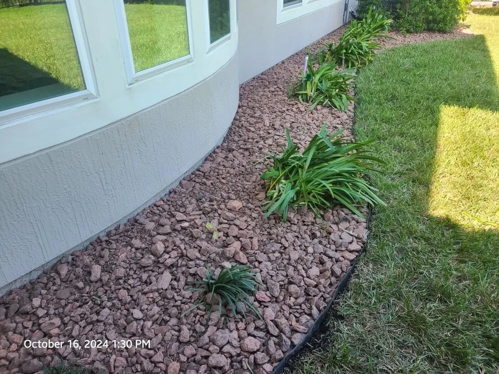 Professional lawn mowing service for homes in St. Augustine, FL by Rockhard Landscaping