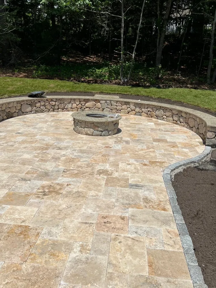 Professional lawn care service for residential properties across Orleans, MA - Rockland Landscaping and Masonry