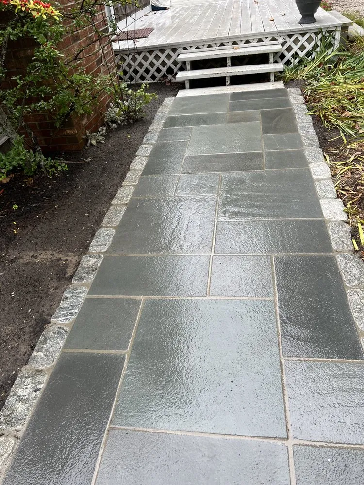 Top-rated lawn mowing service for homes in Orleans, MA by Rockland Landscaping and Masonry