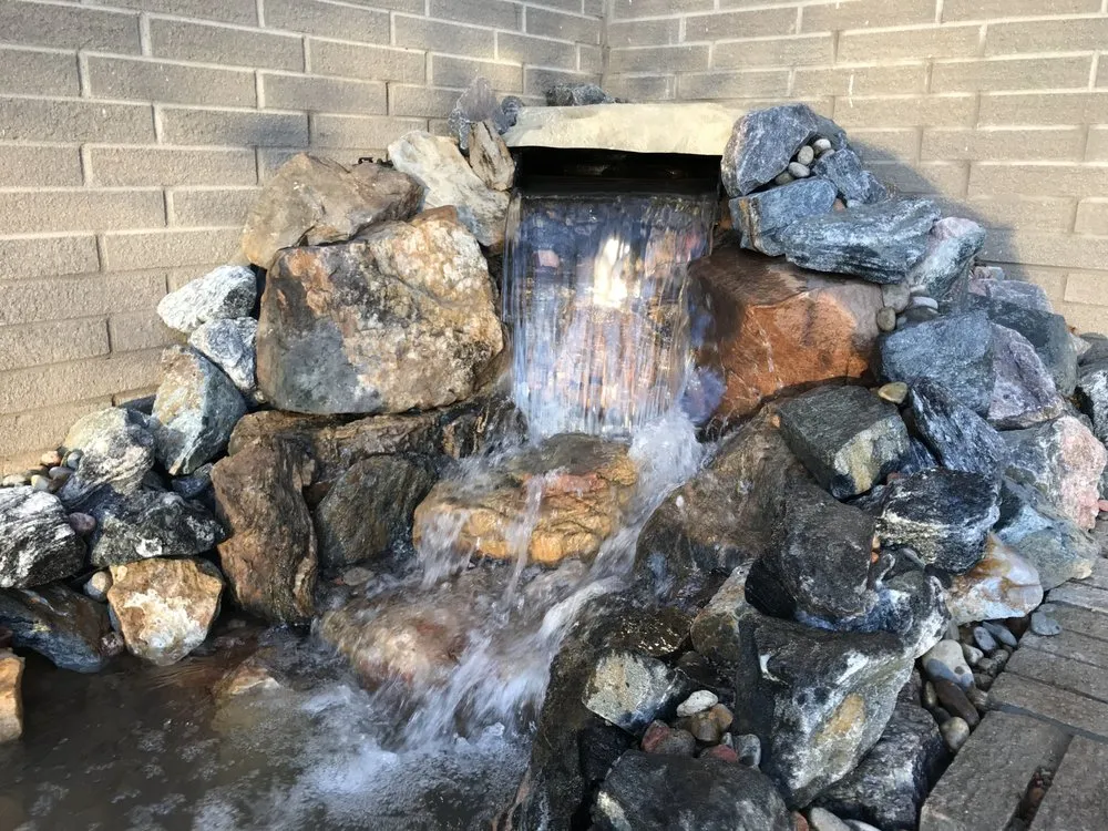 Custom landscape installation with custom design in Denver, CO by RockStar Aquatics