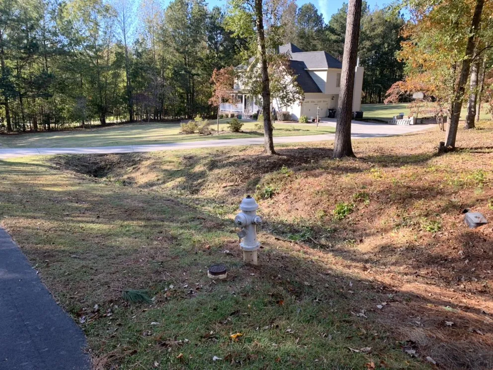 Top-rated lawn mowing service for residential properties in Covington, GA by Rockstar Lawn Care