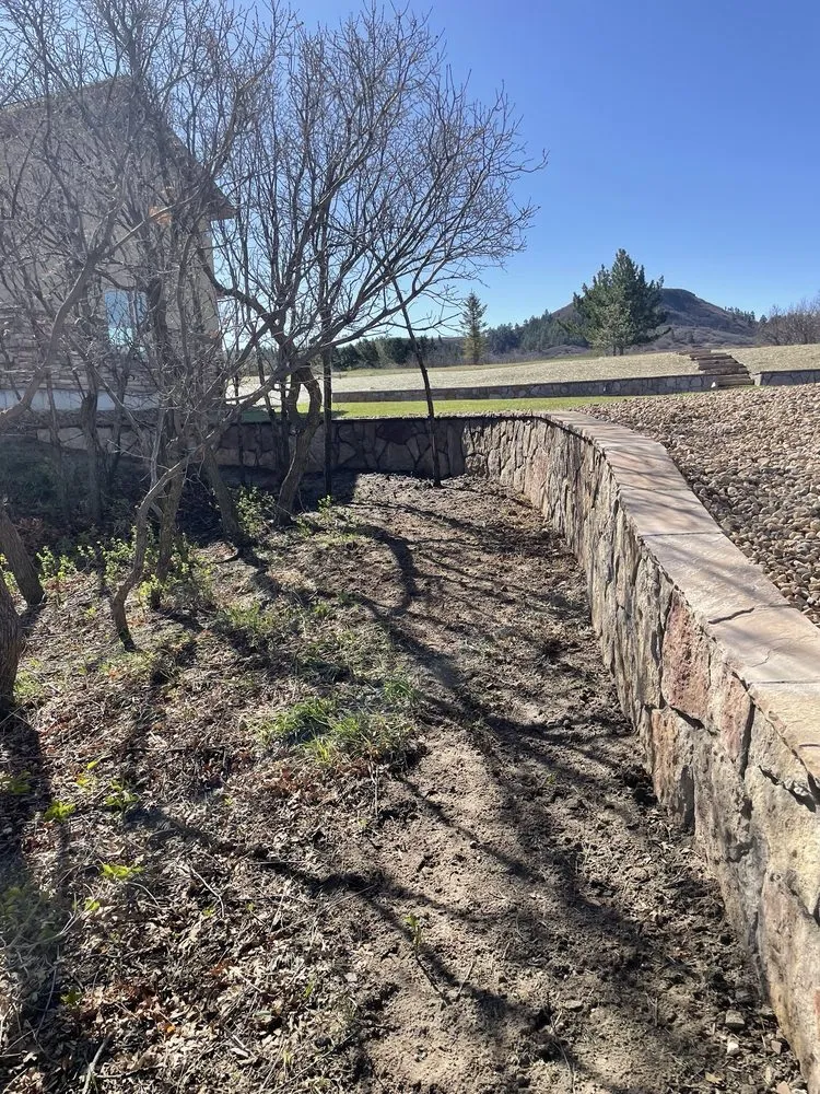 Reliable yard cleanup service experts serving Parker, CO - Rocky Mountain Pond and Waterfall