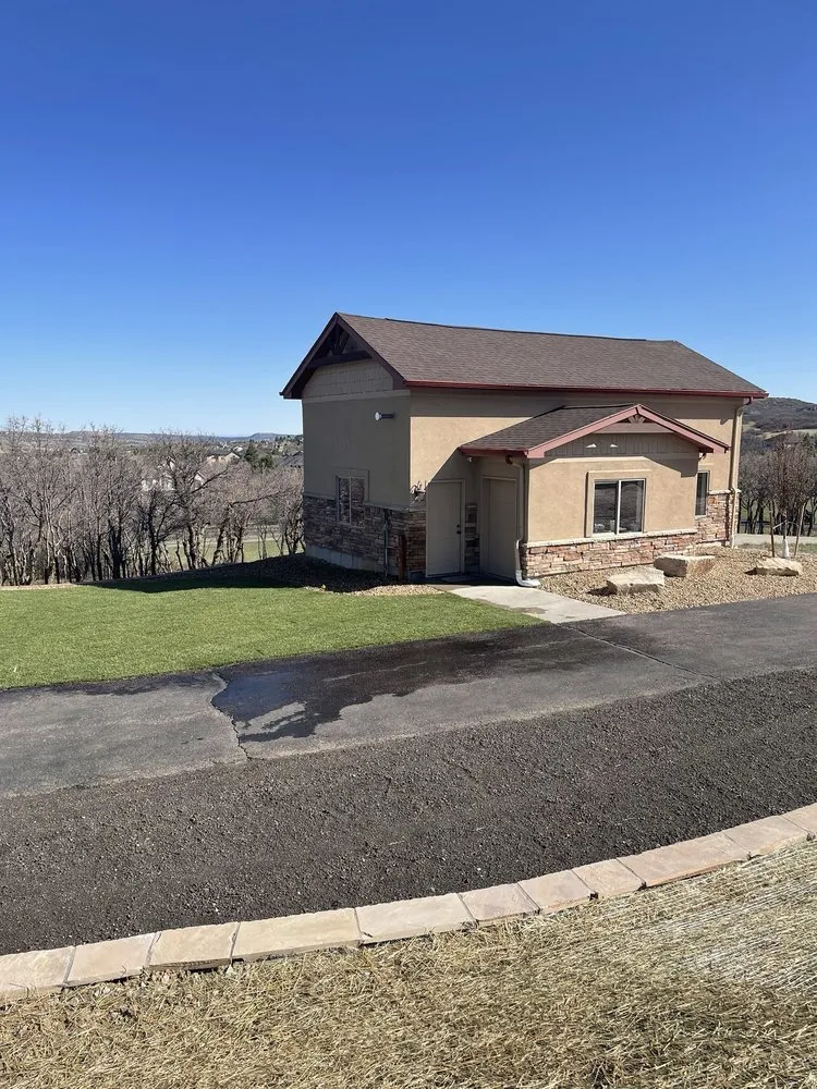 Affordable landscape design for year-round maintenance in Parker, CO by Rocky Mountain Pond and Waterfall