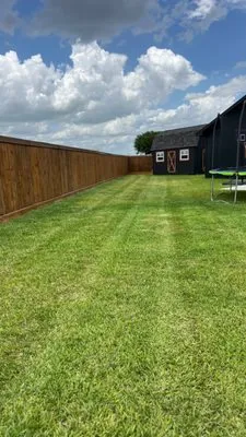 Rodriguez Lawn Care & More Logo