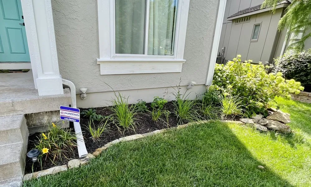 Expert lawn mowing service for residential properties in Lees Summit, MO by Rogue Natives