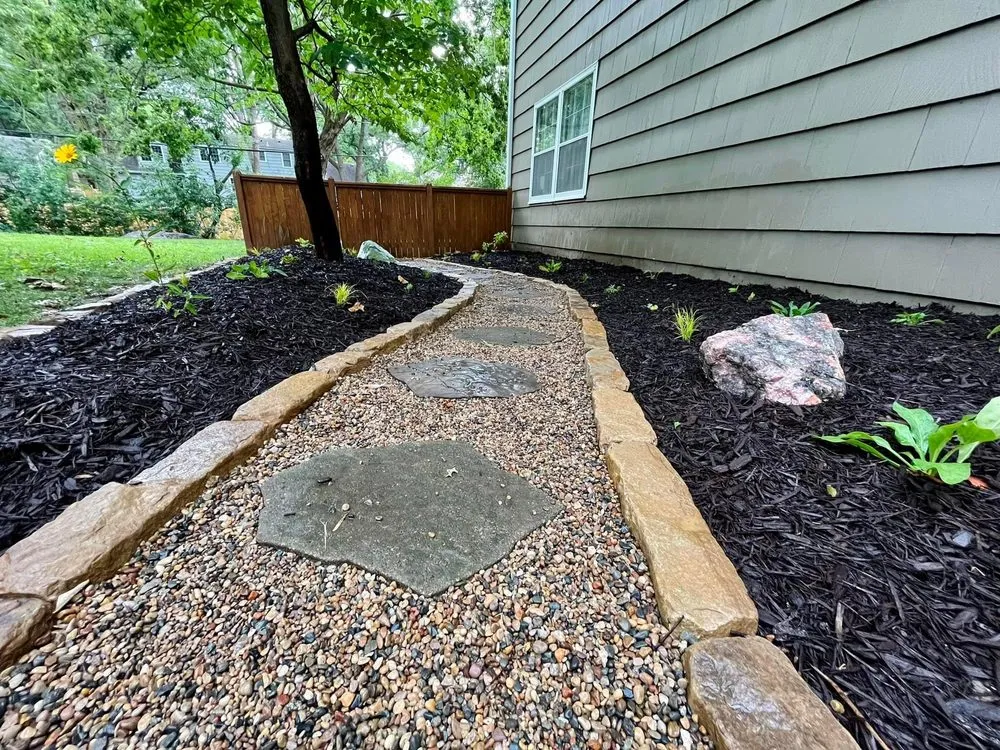 Affordable lawn mowing service with custom design across Lees Summit, MO - Rogue Natives