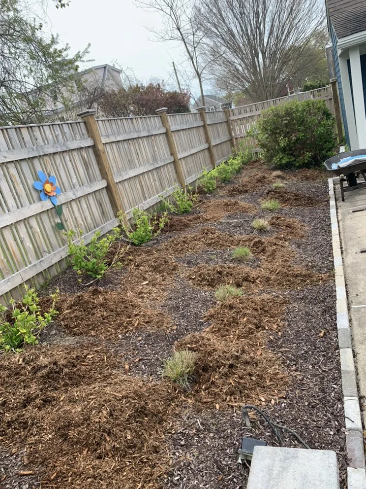 Custom yard cleanup service for year-round maintenance in Middletown, RI by Rojas Landscaping