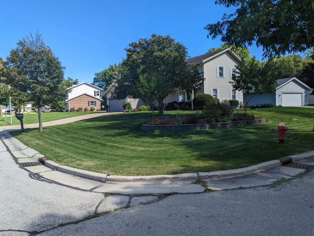 Expert yard maintenance for residential properties in Kenosha, WI by Rokey Lawn Care