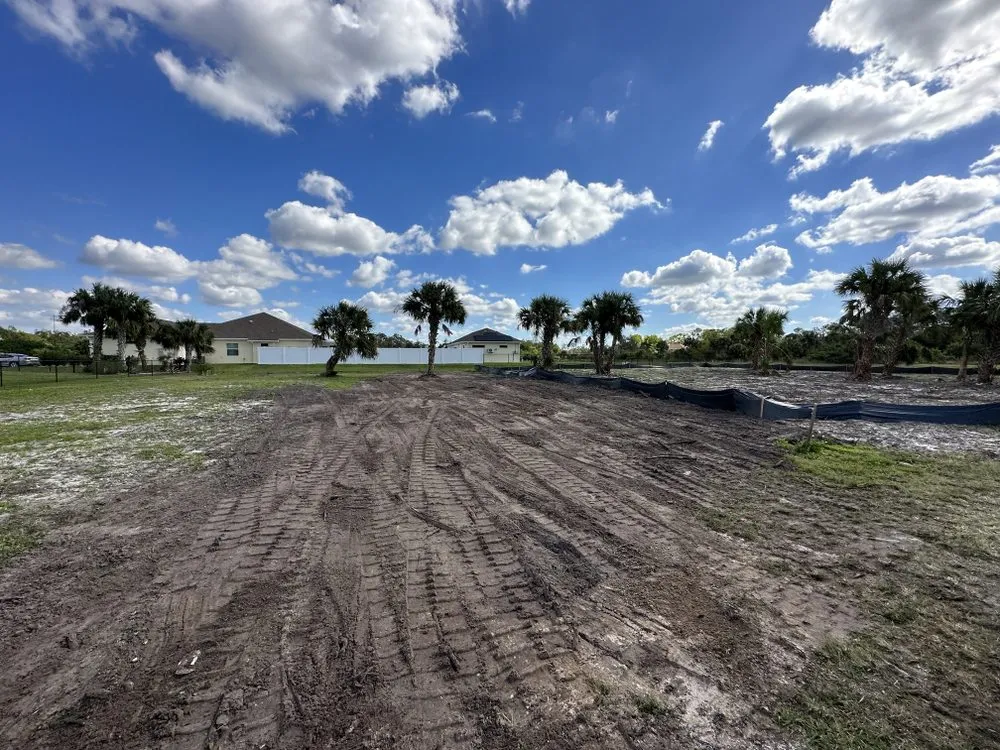 Affordable outdoor landscaping for residential properties in Port Charlotte, FL by Roko Construction & Land Services