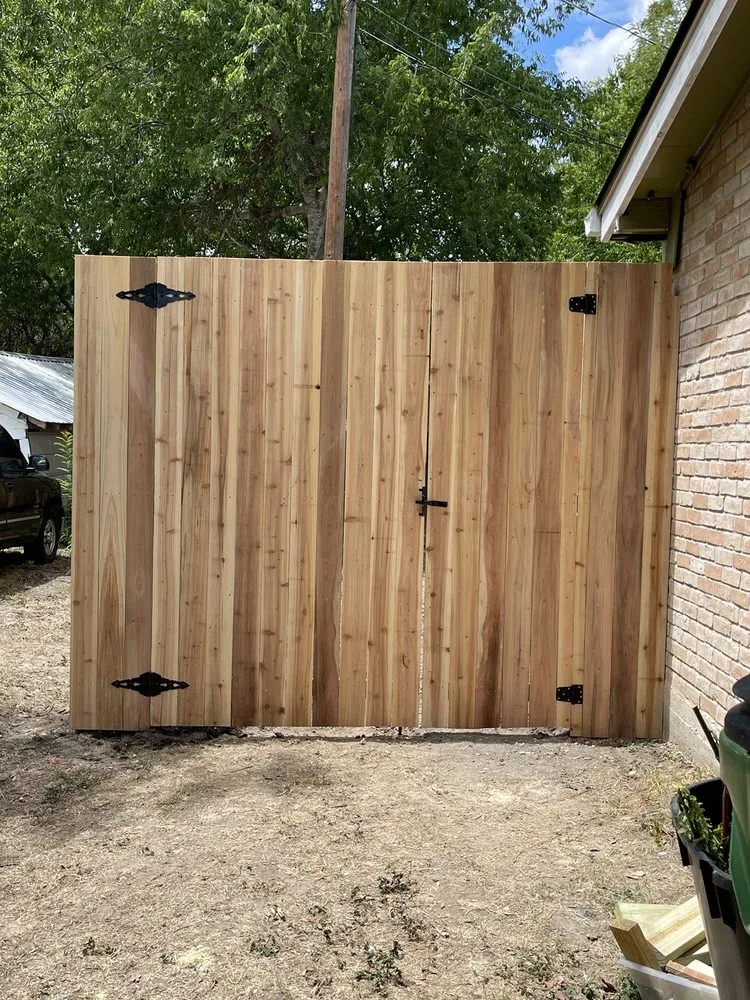 Trusted lawn mowing service for homes in Lockhart, TX by Roland Landscaping & Fence Building