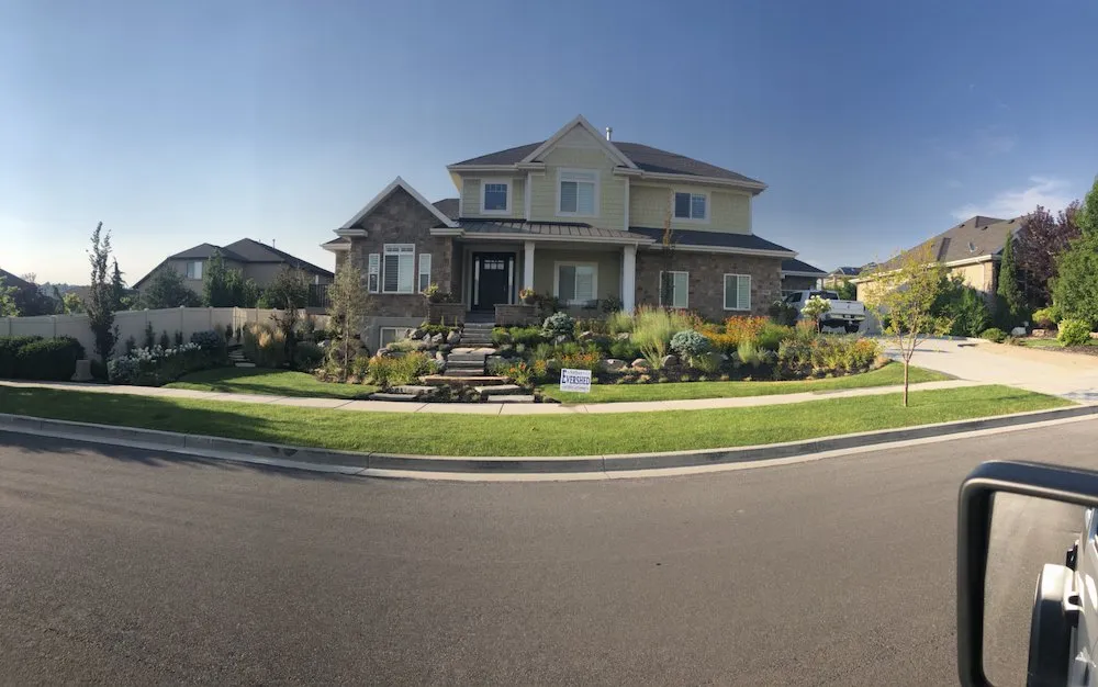 Expert outdoor landscaping for residential properties in Sandy, UT by Rollins Landscaping