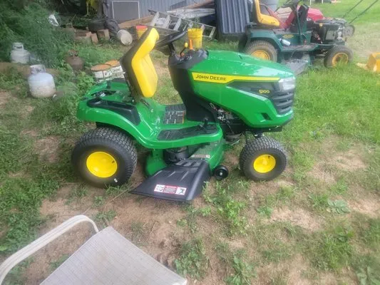 Roman And Anthony's Lawn Mowing Logo