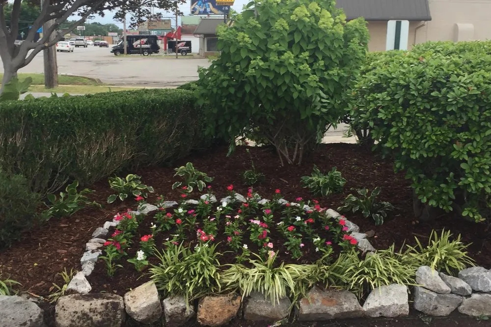 Custom garden landscaping for outdoor upgrades in Huntsville, AL by Romero Landscaping & Lawn Care