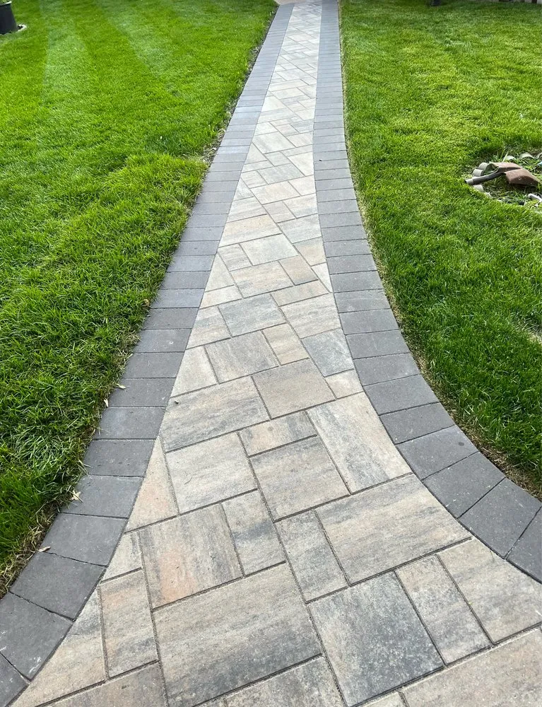 Professional lawn mowing service with custom design in Minneapolis, MN by Romero Landscaping & Tree Service