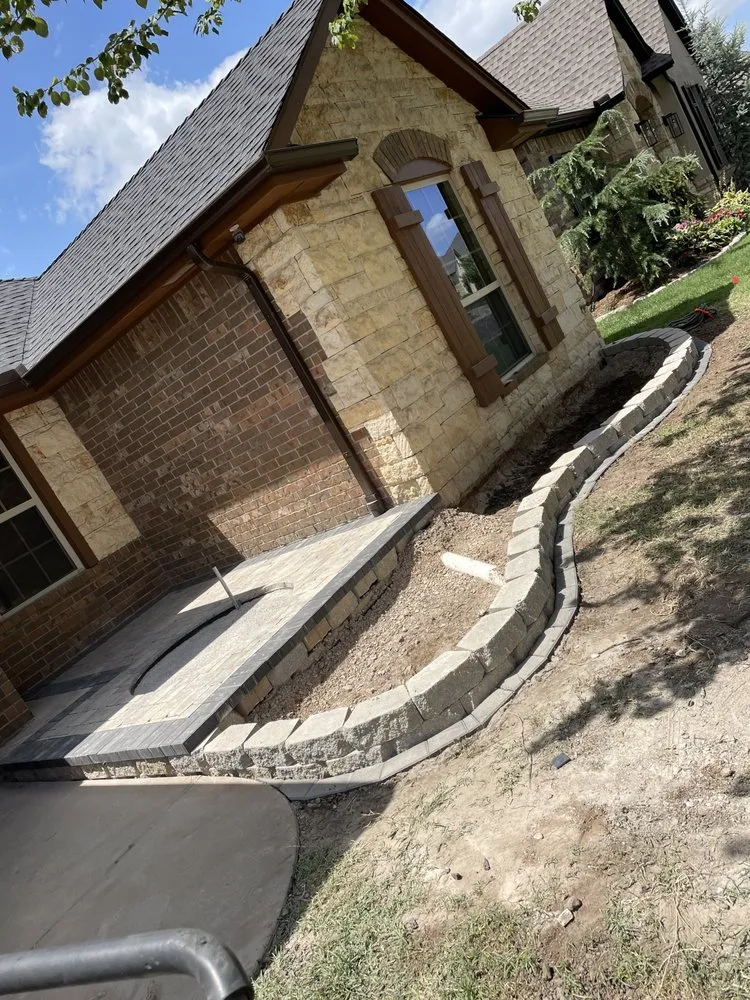 Expert lawn care service for residential properties in Clinton, OK by Romero Pavers & Construction